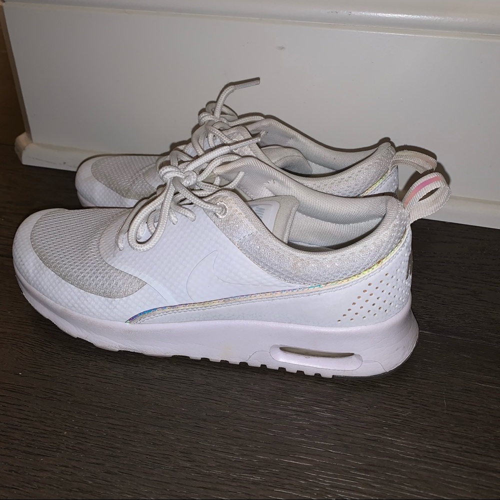 white reflective nike shoes